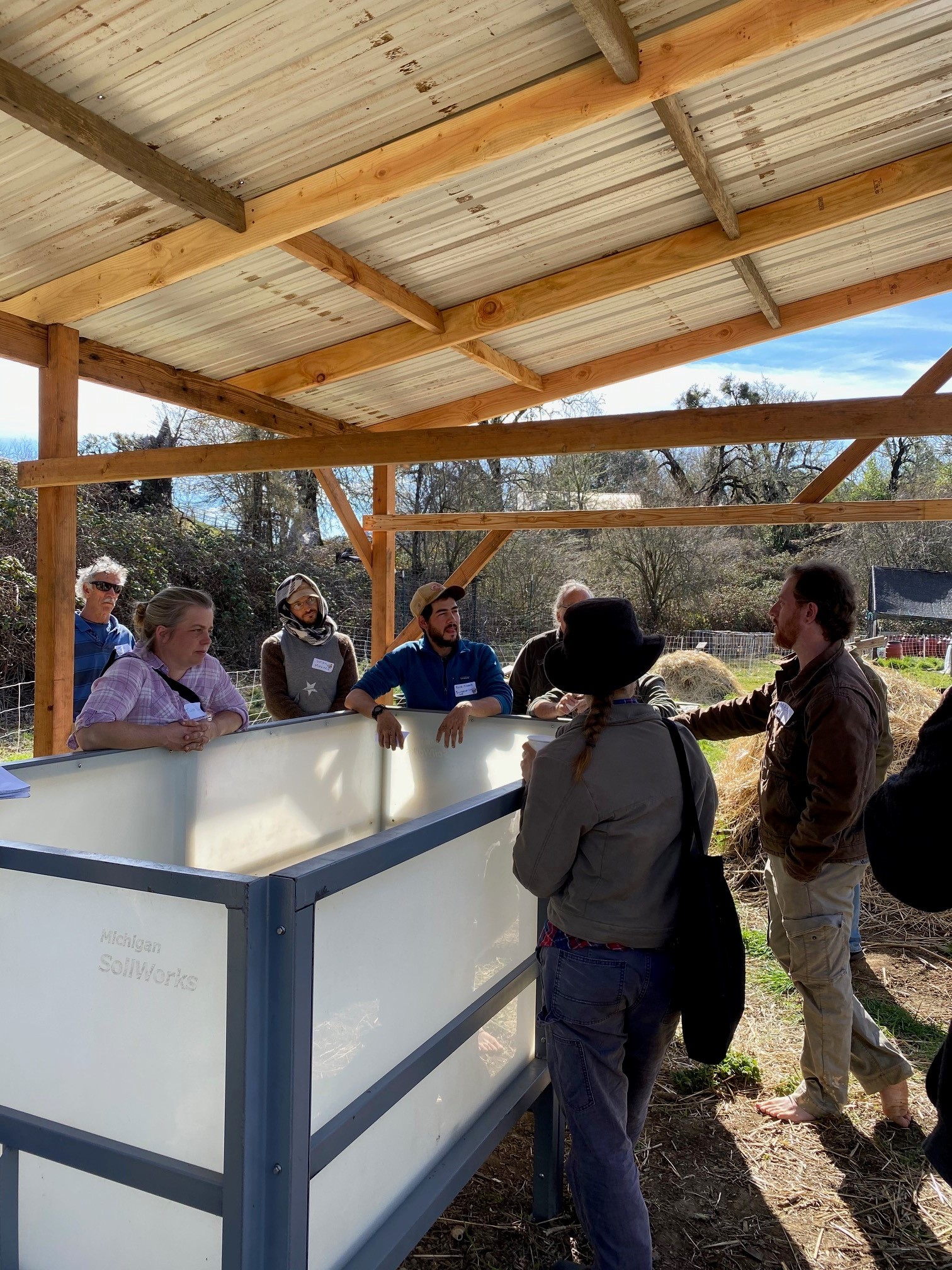 People in a vermiculture workshop having a discussion right next to a Wormgear CFT People in a vermiculture workshop having a discussion right next to a Wormgear CFT